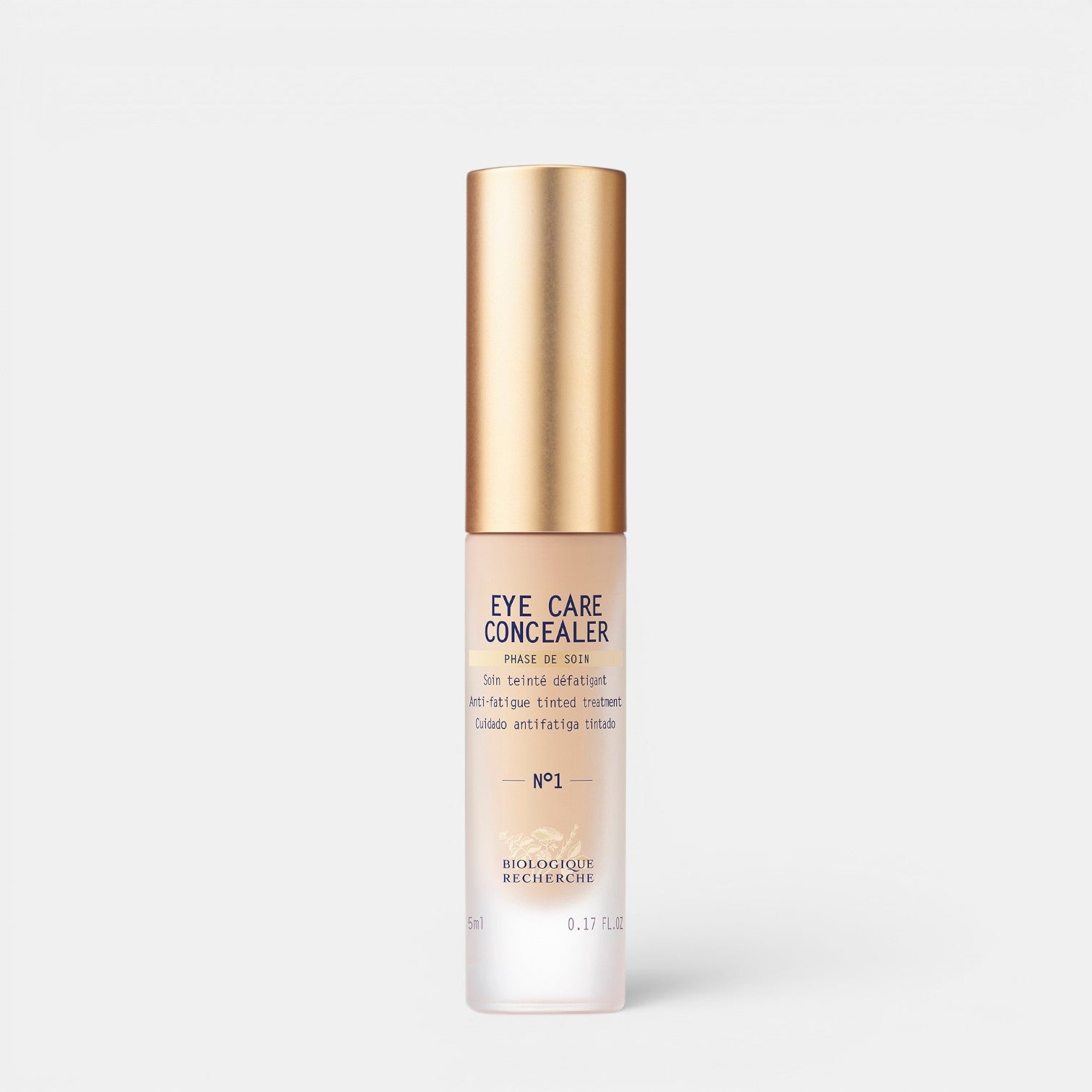 Shop Rescue Spa Eye Care Concealer No 1 in a slim bottle with a gold cap for brightening and smoothing tired eyes