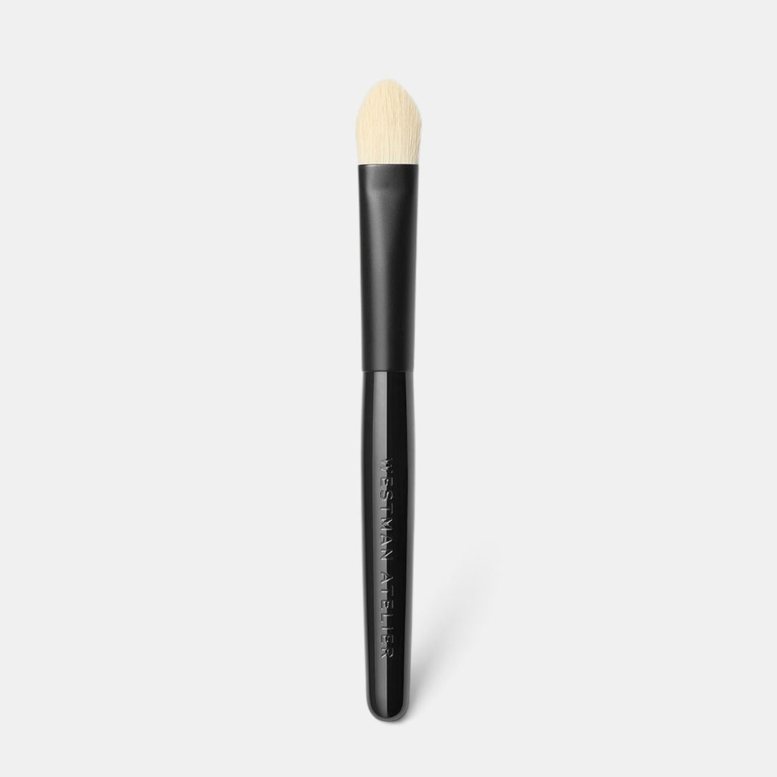 Shop Rescue Spa Westman Atelier Eye Shadow Brush I with tapered white nylon bristles and a black lacquered handle.