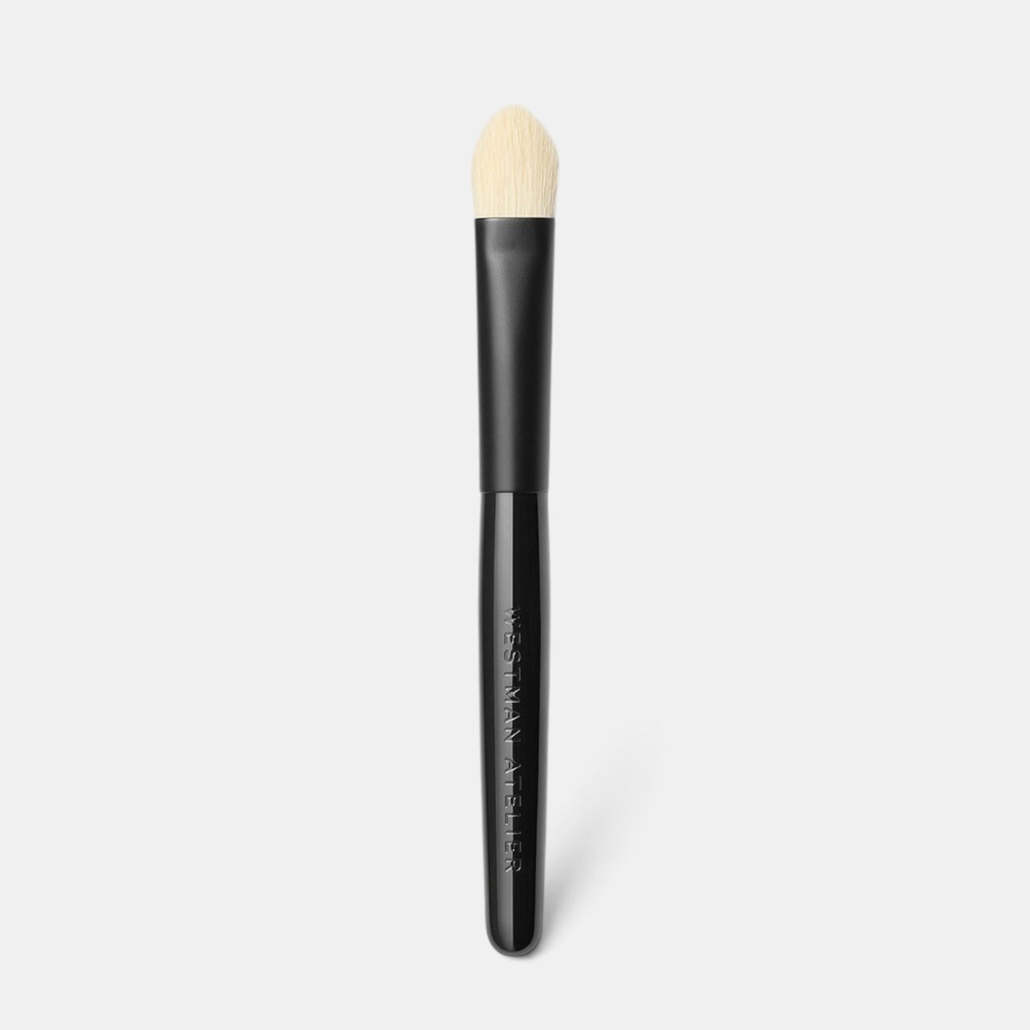 Shop Rescue Spa Westman Atelier Eye Shadow Brush I with tapered white nylon bristles and a black lacquered handle.