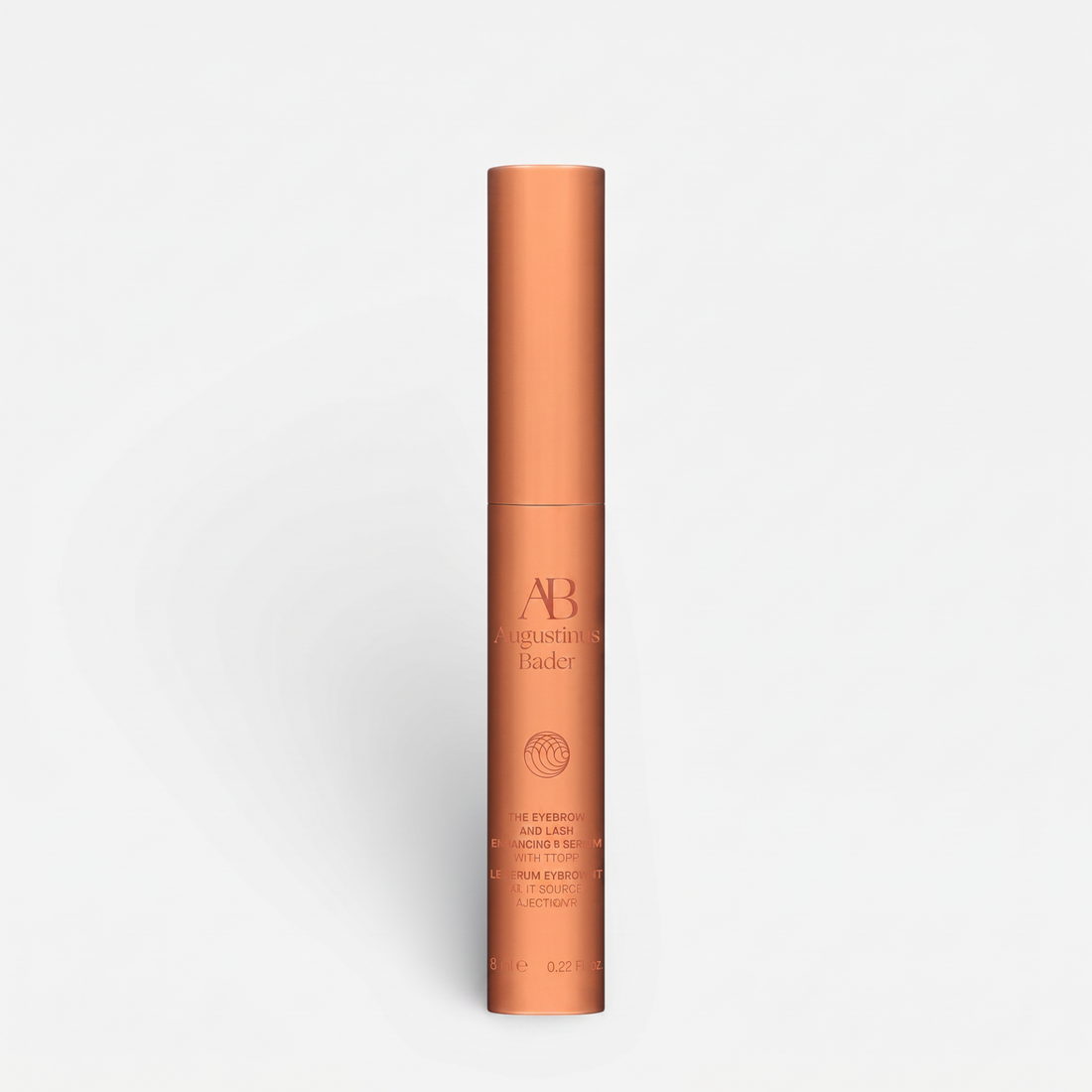 Shop Rescue Spa Augustinus Bader Eyebrow and Lash Enhancing Serum in a sleek metallic copper tube