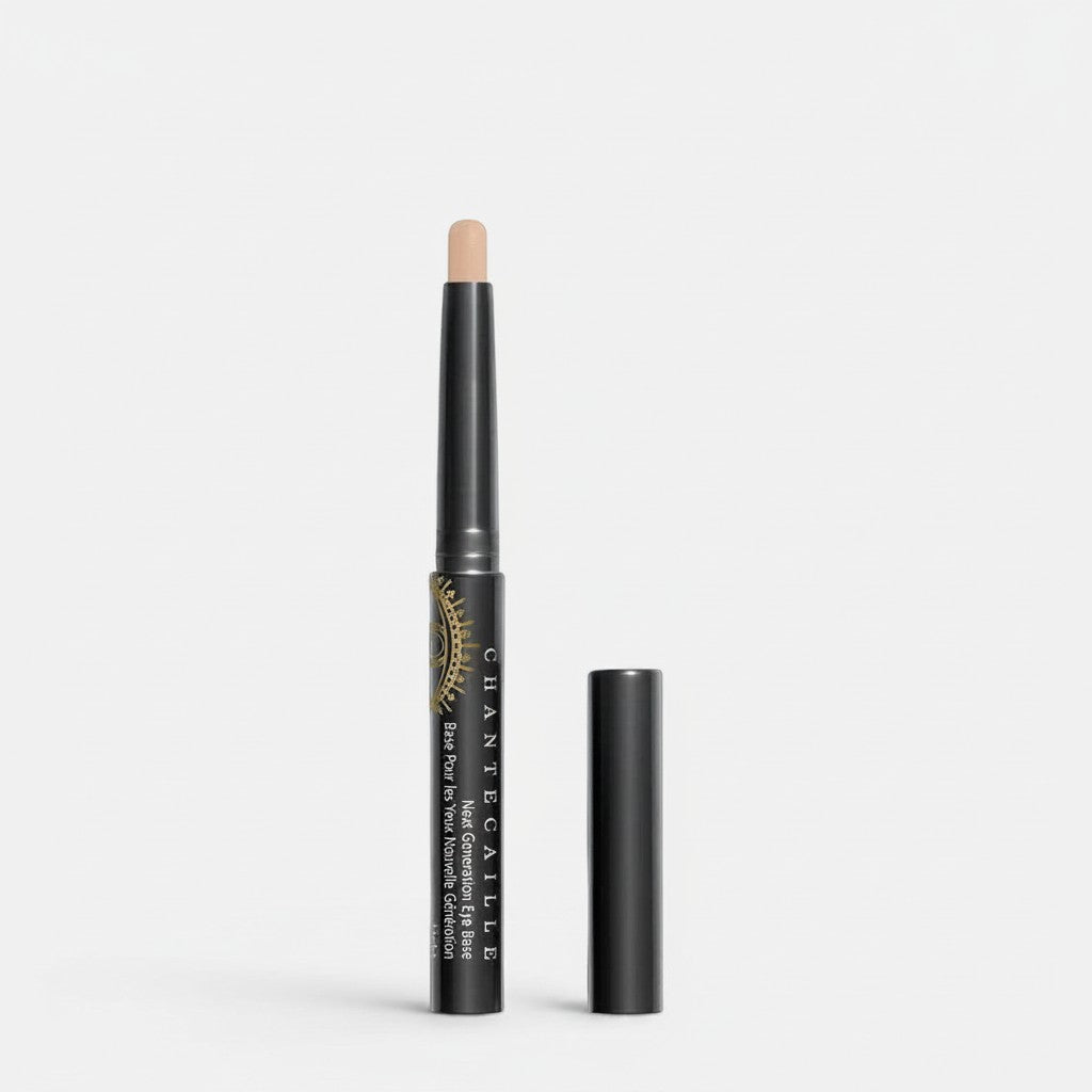 Shop Rescue Spa Chantecaille Next Generation Eye Base in a neutral beige shade, in a black twist-up tube with gold accents.