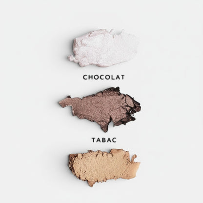 Shop Rescue Spa Eye Pods Les Jours eyeshadow trio swatches in Neige, Chocolat, and Tabac cream-powder shades.