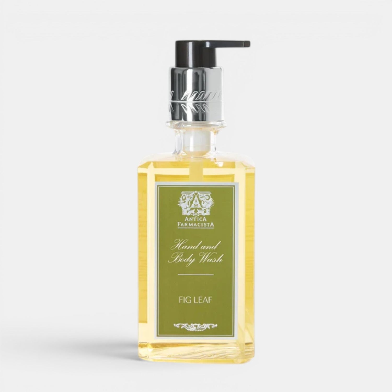 Shop Rescue Spa Fig Leaf hand and body wash in a clear glass bottle with a silver pump dispenser