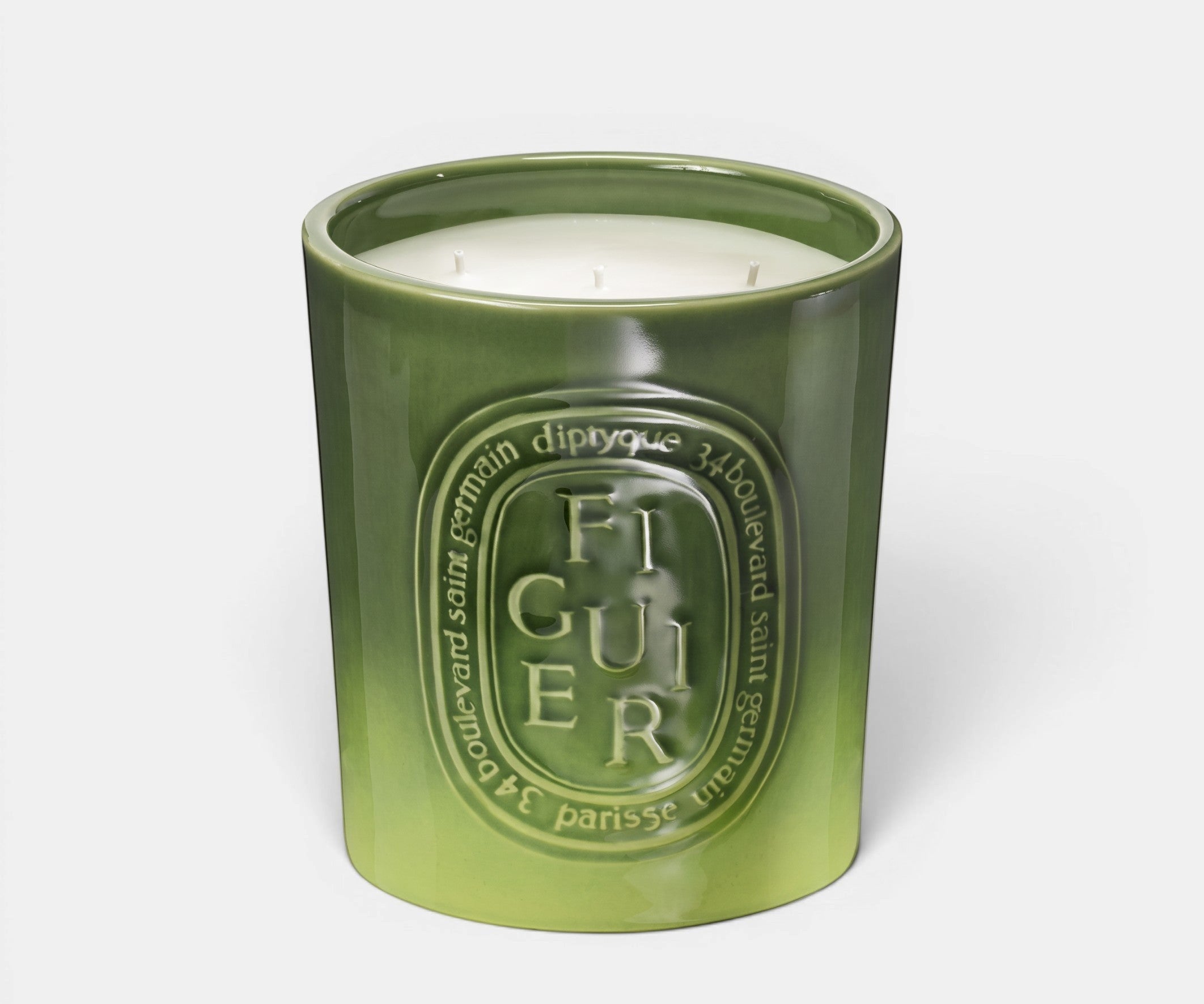 Shop Rescue Spa Figuier five-wick candle in a handmade green earthenware pot with embossed oval branding