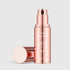 Shop Rescue Spa FOREO Supercharged Serum 2.0 in a metallic rose gold pump bottle with the cap removed.