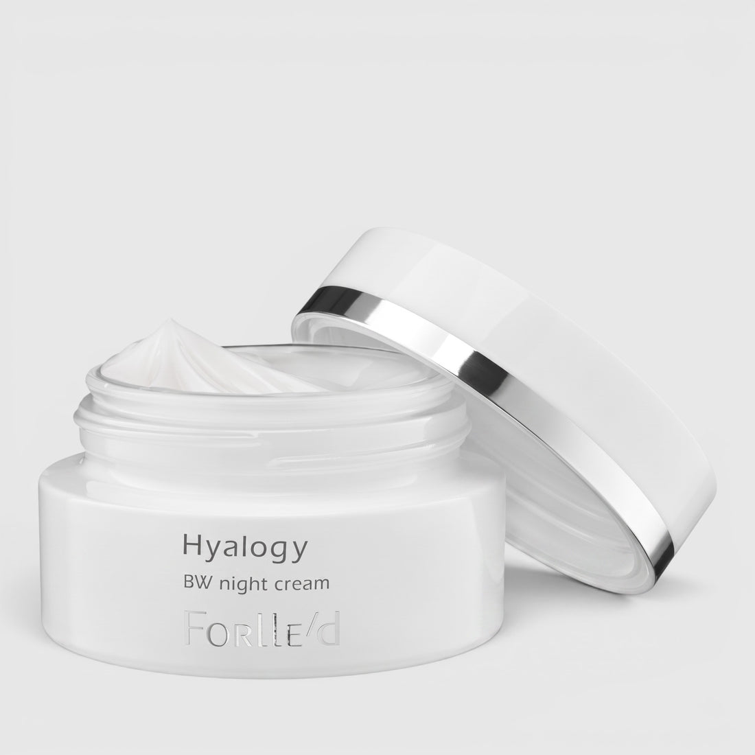 Shop Rescue Spa Forlle’d Hyalogy BW Night Cream in a white jar with a silver-rimmed lid for brightening skin tone.