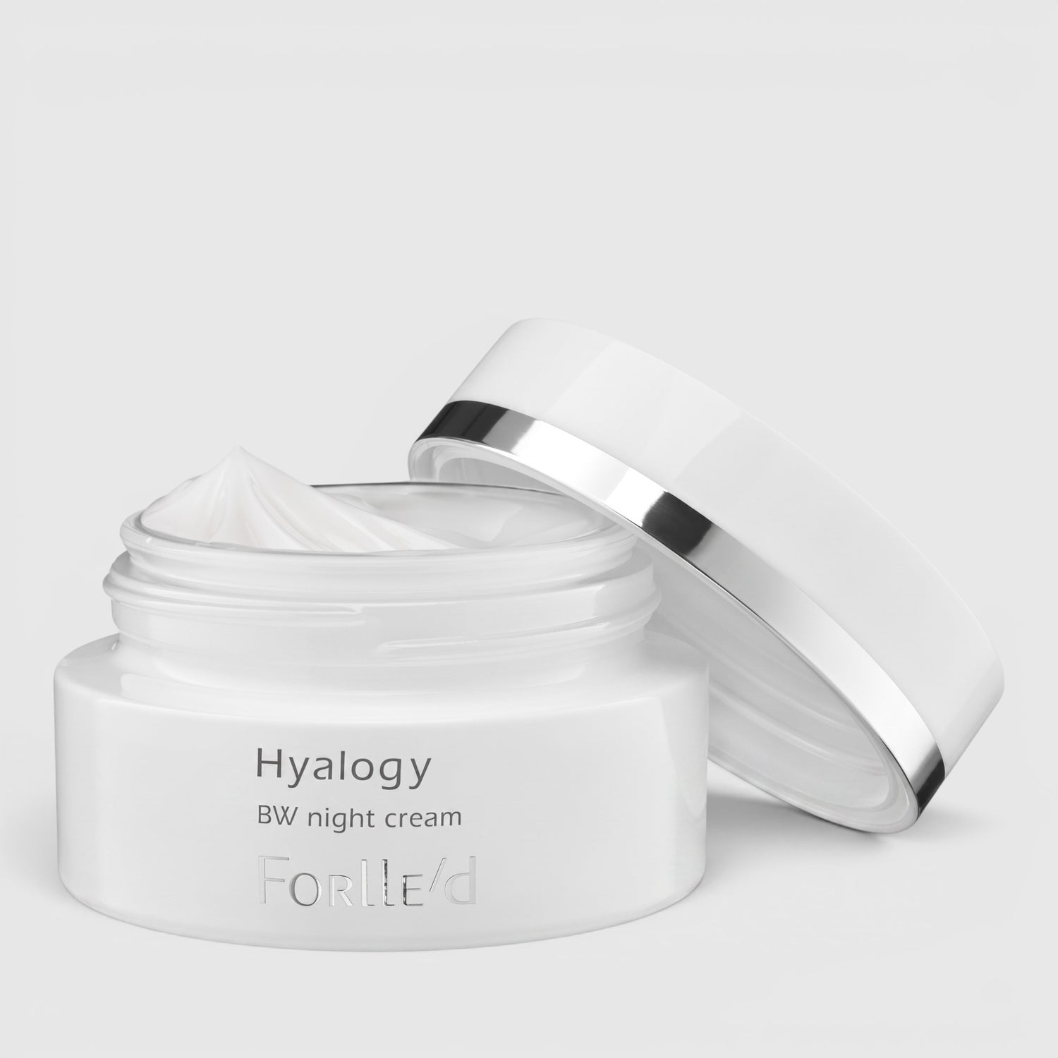 Shop Rescue Spa Forlle’d Hyalogy BW Night Cream in a white jar with a silver-rimmed lid for brightening skin tone.