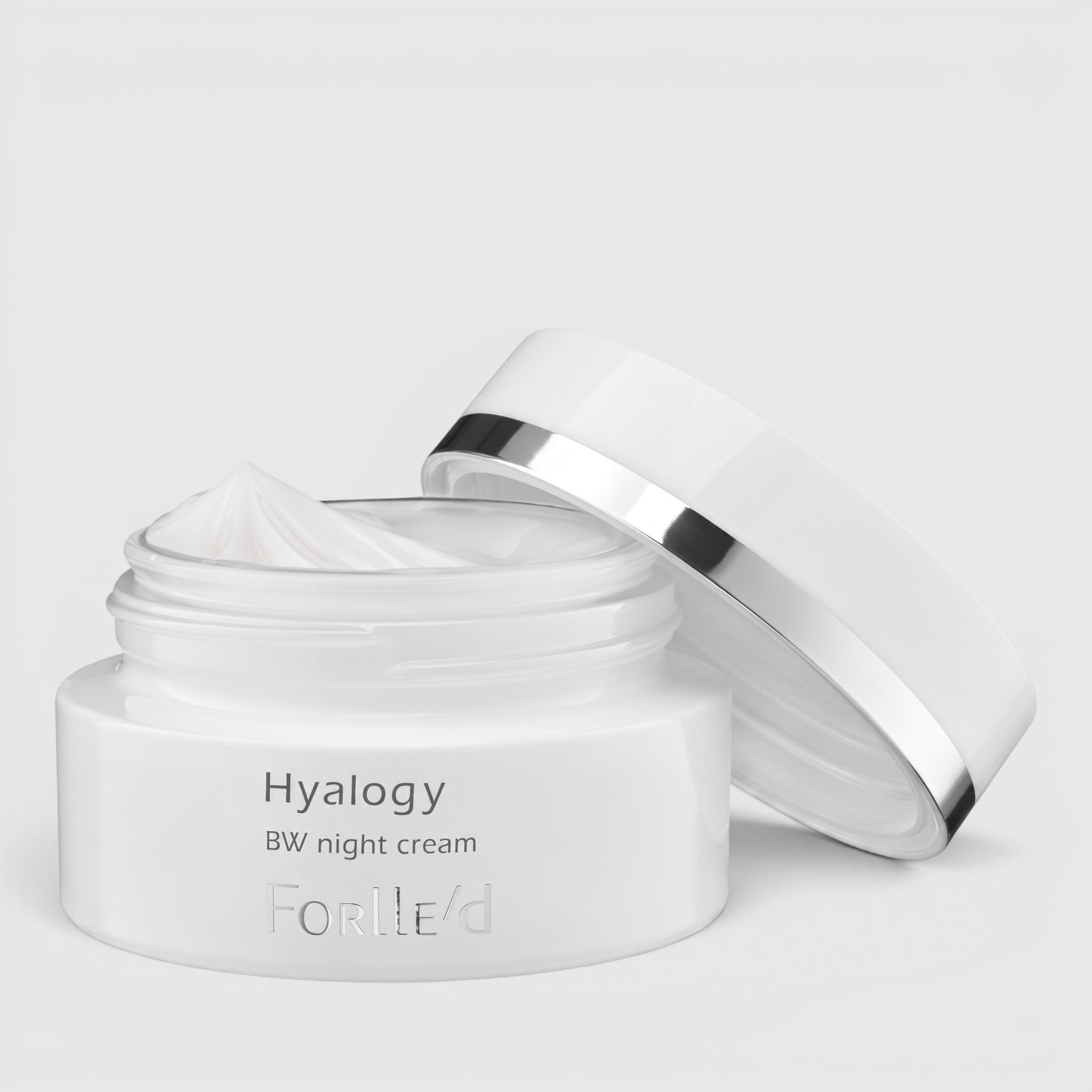 Shop Rescue Spa Forlle’d Hyalogy BW Night Cream in a white jar with a silver-rimmed lid for brightening skin tone.