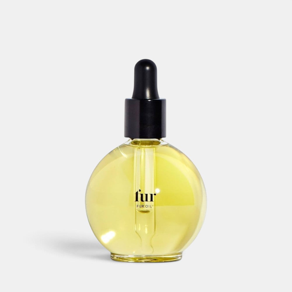 Shop Rescue Spa Fur Oil in a round glass bottle with a black dropper cap for softening hair and clearing pores.
