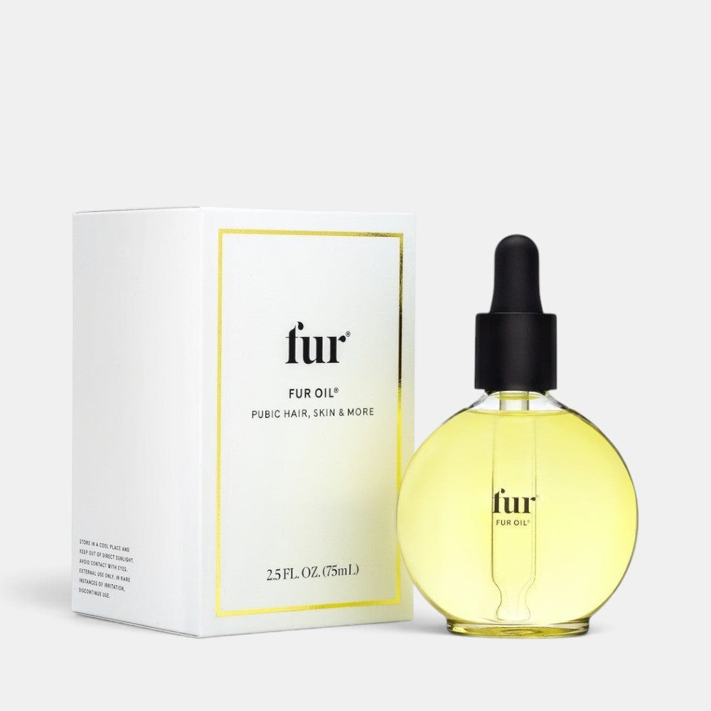 Shop Rescue Spa Fur Oil in a round glass bottle with a dropper next to its white and gold product box.