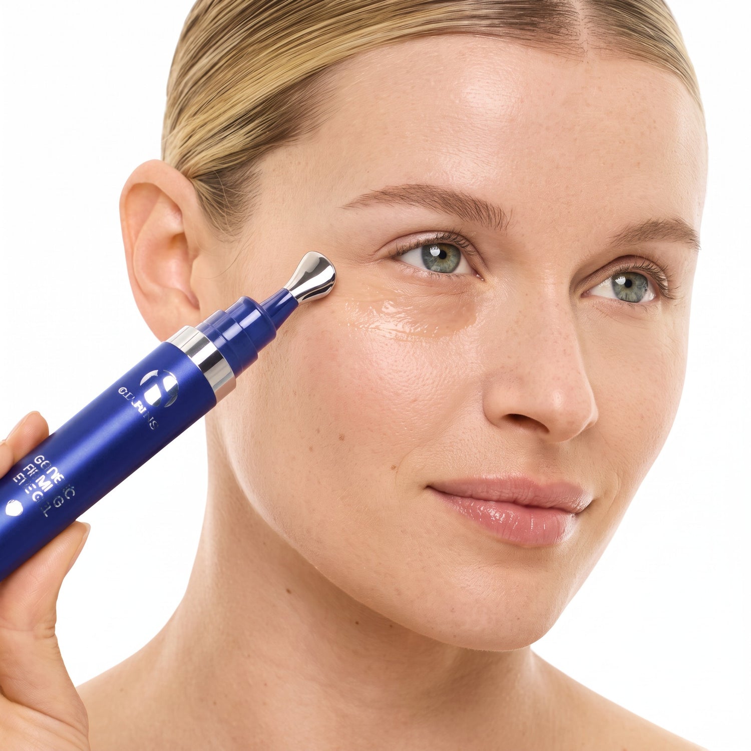 Shop Rescue Spa GeneXC Firming Eye Gel being applied with a cooling metal applicator tip to a woman&