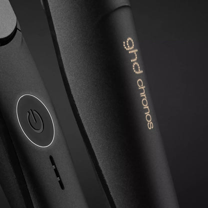 Shop Rescue Spa ghd Chronos flat iron in matte black with power button and motion-responsive technology branding
