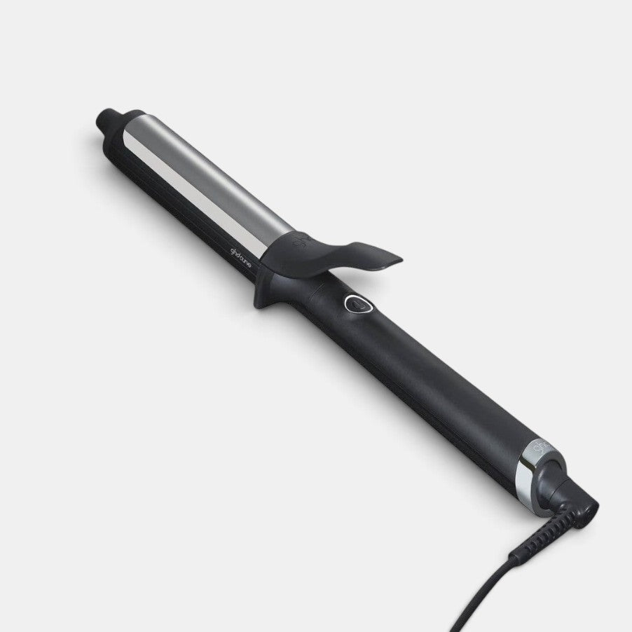 Shop Rescue Spa ghd curve soft curl iron with 1.25 inch barrel, ergonomic clamp, and cool tip for hair styling.