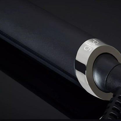 Shop Rescue Spa ghd Glide smoothing hot brush featuring a sleek black matte finish and metallic silver detail