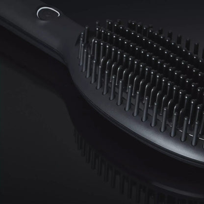Shop Rescue Spa ghd Glide smoothing hot brush with black ceramic bristles for frizz-free hair styling