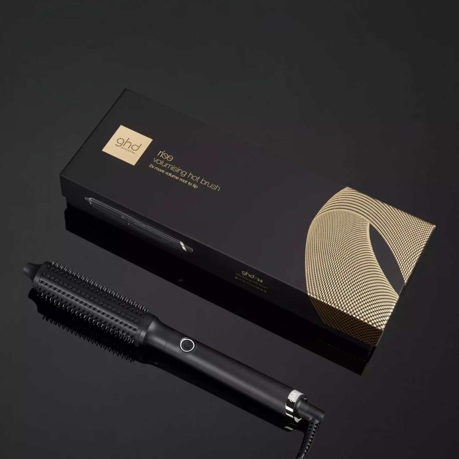 Shop Rescue Spa ghd rise volumizing hot brush with black barrel and packaging on a reflective surface