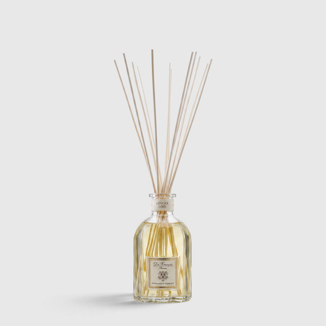 Shop Rescue Spa Ginger Lime room diffuser in a glass bottle with reed sticks for a fresh citrus and ginger scent.