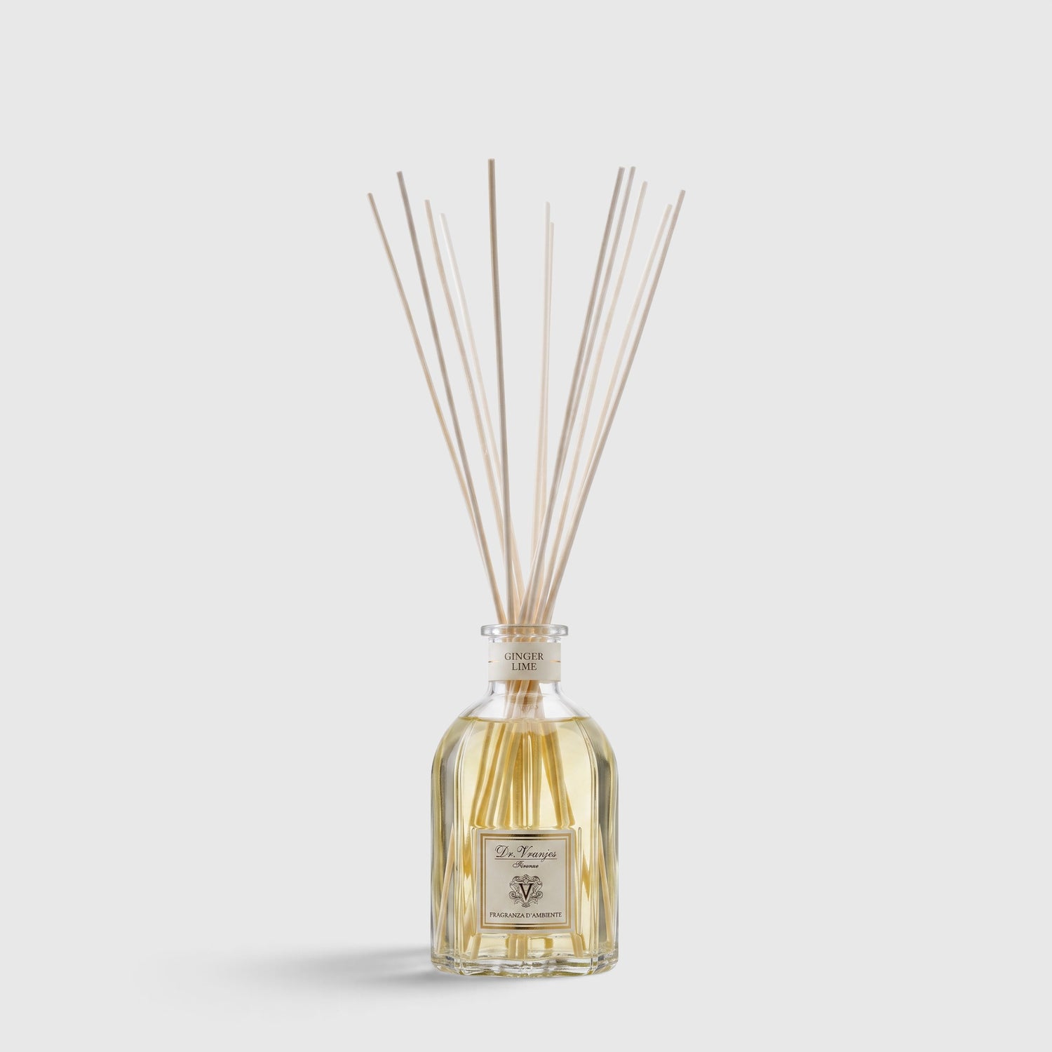 Shop Rescue Spa Ginger Lime room diffuser in a glass bottle with reed sticks for a fresh citrus and ginger scent.