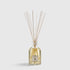 Shop Rescue Spa Ginger Lime room diffuser in a glass bottle with reed sticks for a fresh citrus and ginger scent.