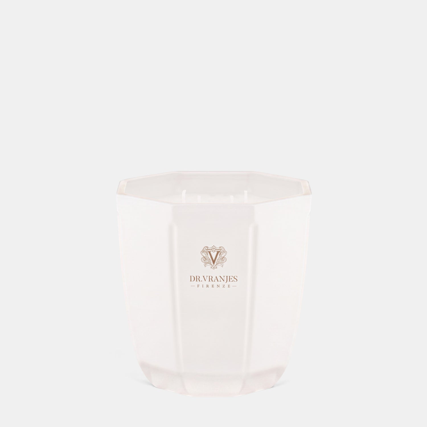 Shop Rescue Spa Ginger Lime scented candle in a white pearl-finish hexagonal glass vessel with Dr. Vranjes logo.