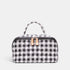 Shop Rescue Spa black and white gingham accordion cosmetic bag with top handle, leather trim, and silver hardware.