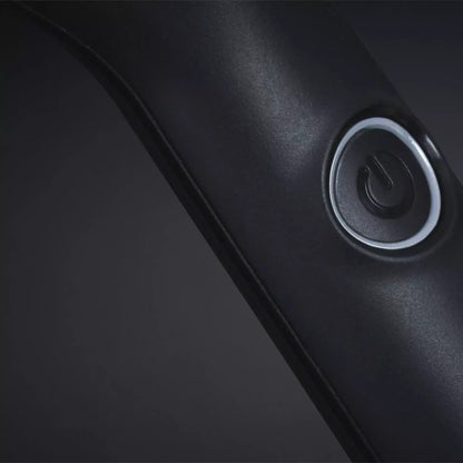 Shop Rescue Spa ghd Glide hot brush power button with illuminated ring on a matte black handle