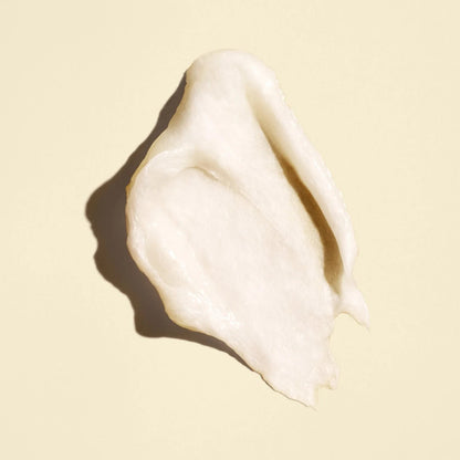 Shop Rescue Spa Gold Lust Transformative Mask creamy white hair treatment texture swatch on a light beige background