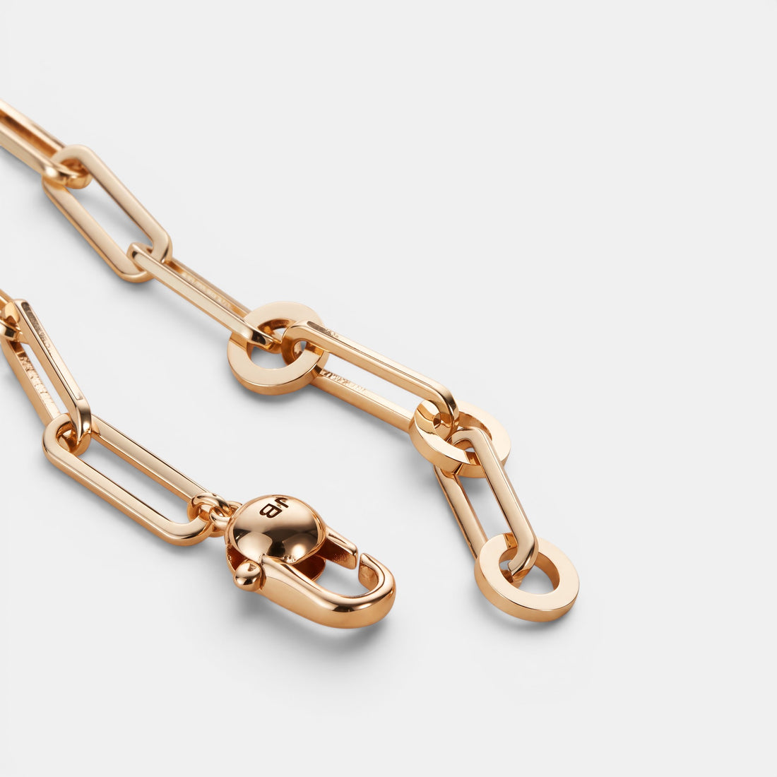 Shop Rescue Spa Andi Slim gold-tone paperclip bracelet with high-polish finish and custom ball closure.