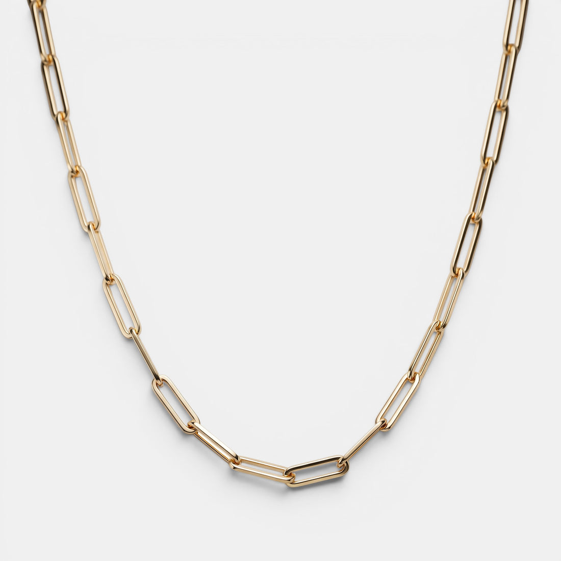 Shop Rescue Spa Andi Slim Chain necklace in high-polish gold-tone brass with a modern paperclip link design.