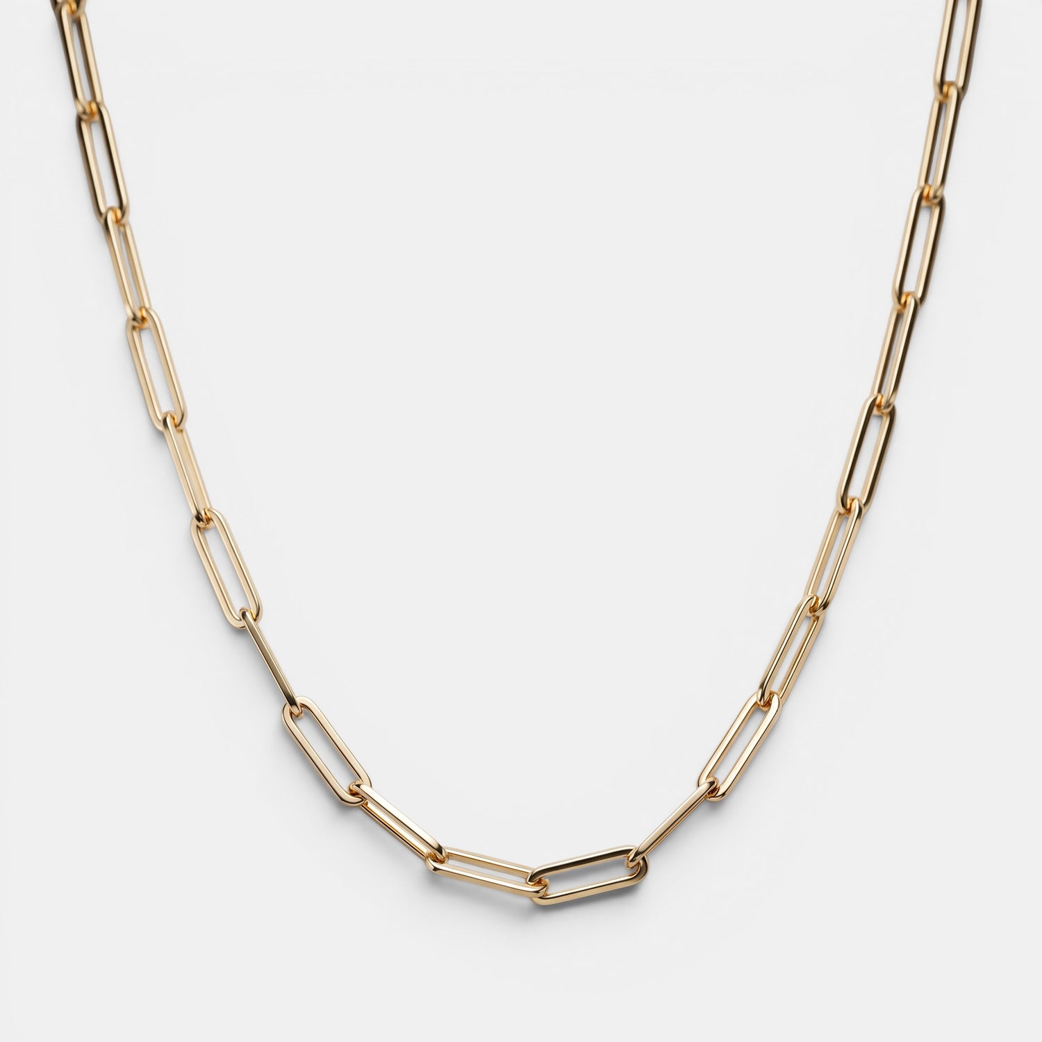 Shop Rescue Spa Andi Slim Chain necklace in high-polish gold-tone brass with a modern paperclip link design.