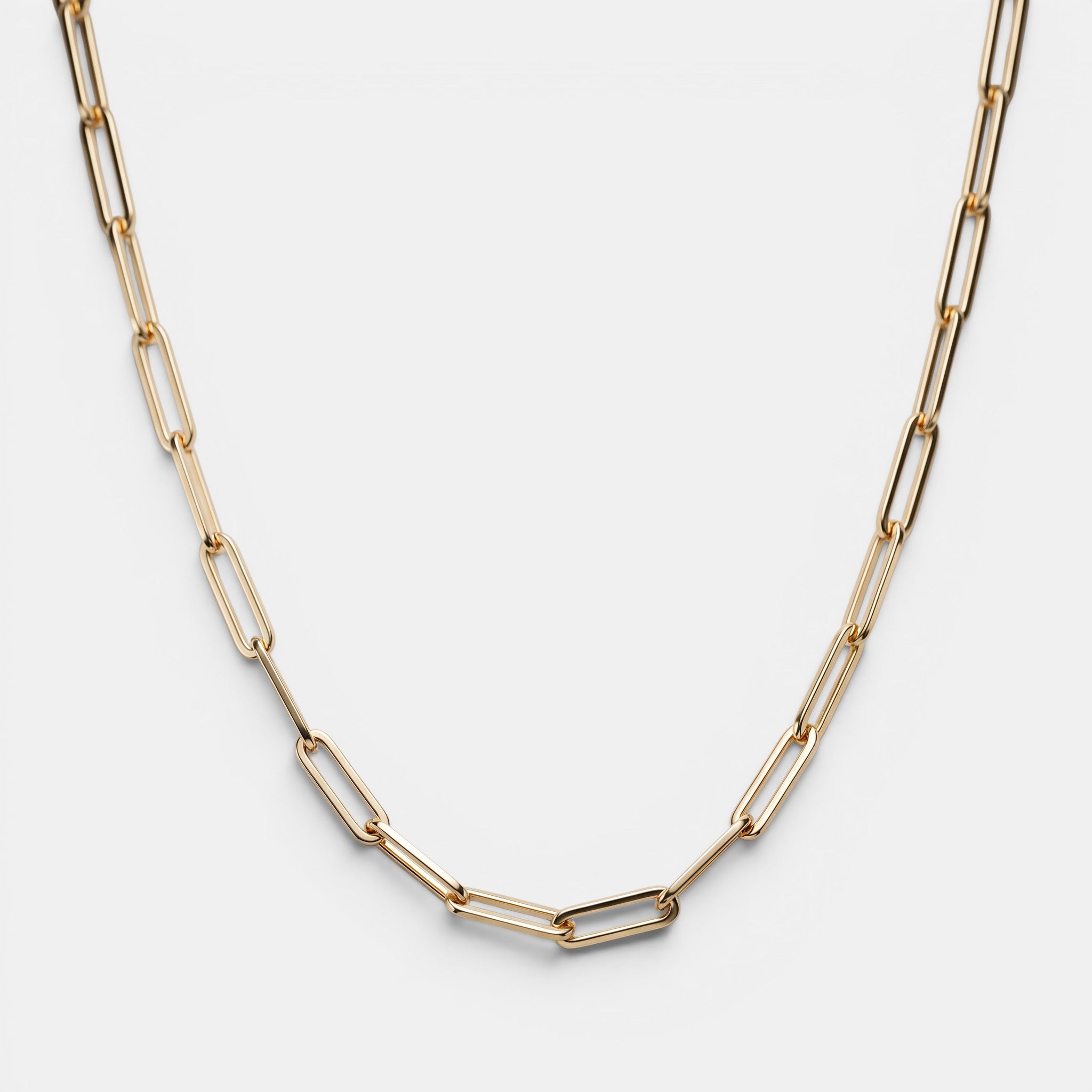 Shop Rescue Spa Andi Slim Chain necklace in high-polish gold-tone brass with a modern paperclip link design.