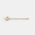 Shop Rescue Spa gold taper candle snuffer with a bell-shaped head and long handle.