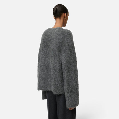 Shop Rescue Spa grey alpaca blend crewneck sweater with a relaxed fit and fuzzy knit texture, back view.