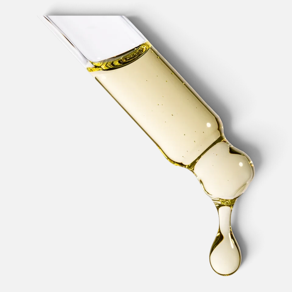 Shop Rescue Spa Augustinus Bader The Hair Oil golden restorative elixir dripping from a glass dropper