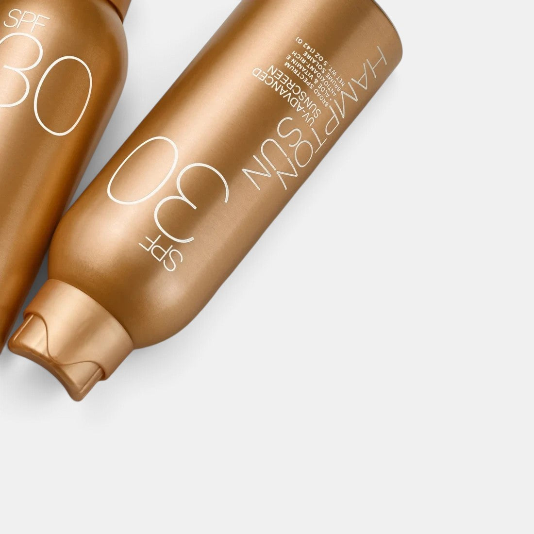 Shop Rescue Spa Hampton Sun SPF 30 UV-Advanced Mist in a metallic gold spray bottle for broad-spectrum sun protection.