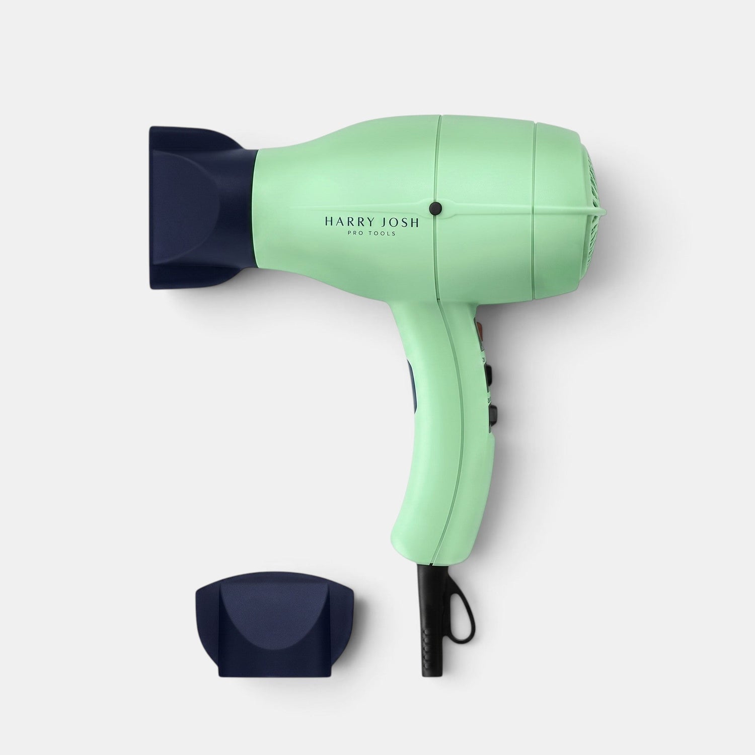 Shop Rescue Spa Harry Josh Pro Dryer 2000 in mint green with a dark blue nozzle attachment on a white background.