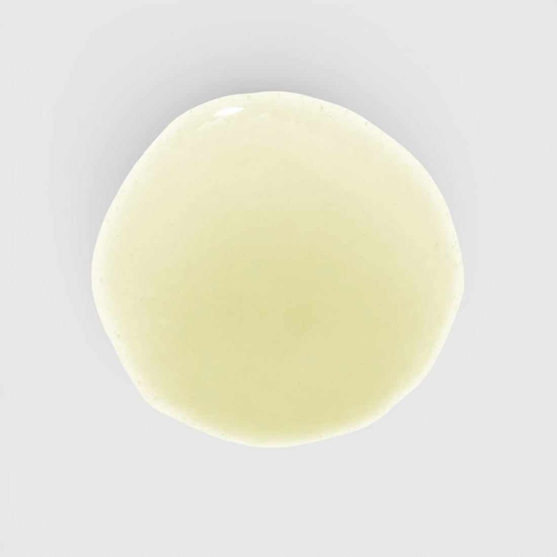 Shop Rescue Spa Holi (glow) Ageless Eye Serum translucent cooling gel texture swatch on a white background
