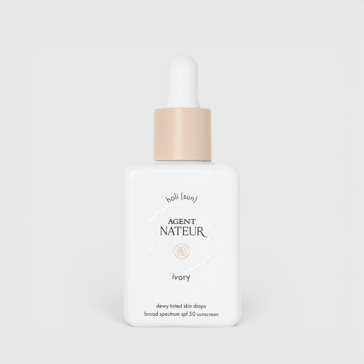 Shop Rescue Spa Holi (sun) SPF 50 dewy tinted skin drops in ivory shade in a white glass bottle with a dropper cap.