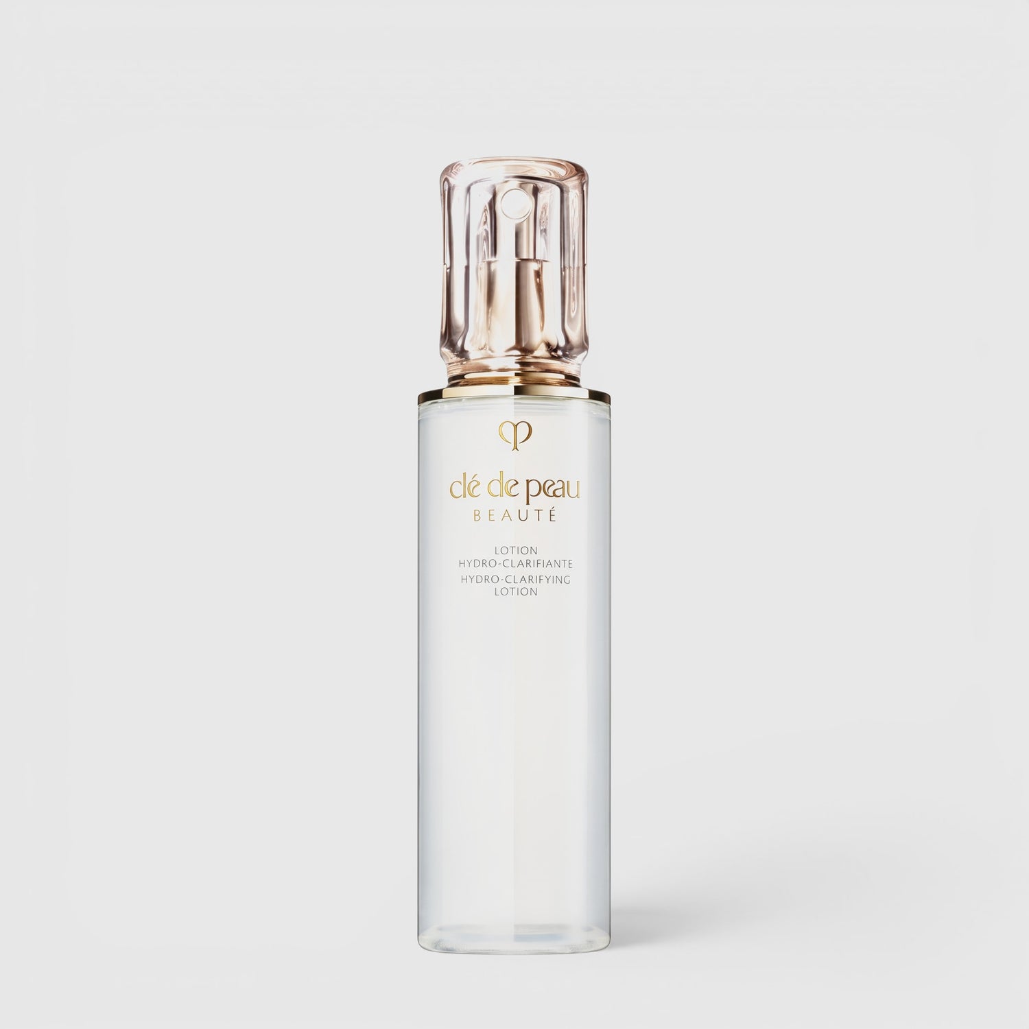 Shop Rescue Spa Clé de Peau Beauté Hydro-Clarifying Lotion in a sleek, clear bottle with a gold pump cap.