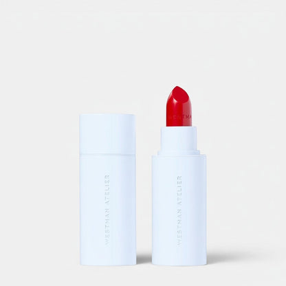 Shop Rescue Spa Westman Atelier Hydrobalm tinted lipstick in a vibrant red shade with a sleek white minimalist case.