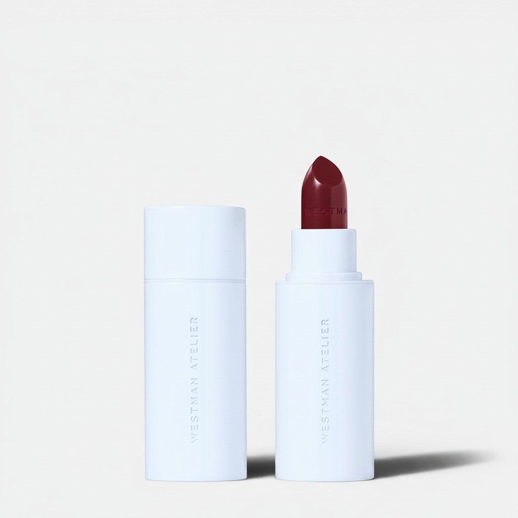 Shop Rescue Spa Hydrobalm Tinted Lipstick in deep berry shade, with a hydrating, buildable formula.