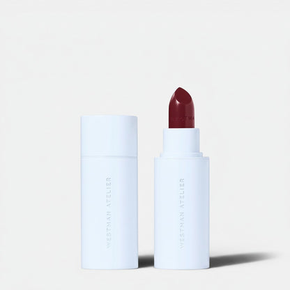 Shop Rescue Spa Hydrobalm Tinted Lipstick in deep berry shade, with a hydrating, buildable formula.