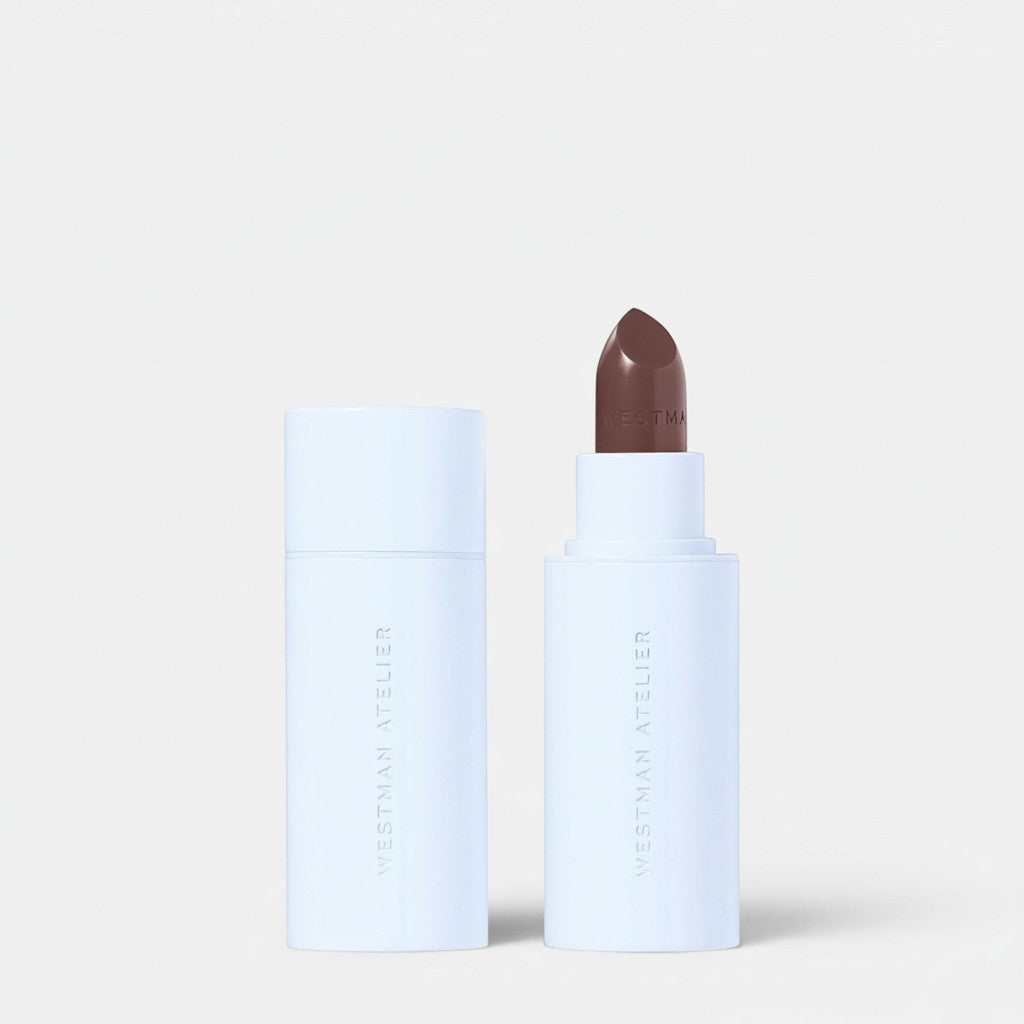 Shop Rescue Spa Hydrobalm Tinted Lipstick in a neutral brown shade, housed in a white tube with a matching cap.