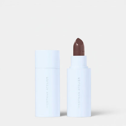 Shop Rescue Spa Hydrobalm Tinted Lipstick in a neutral brown shade, housed in a white tube with a matching cap.