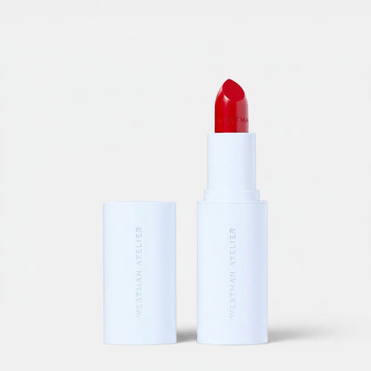 Shop Rescue Spa Hydrobalm Tinted Lipstick in vibrant red, a hydrating lip balm with buildable color and a subtle sheen.