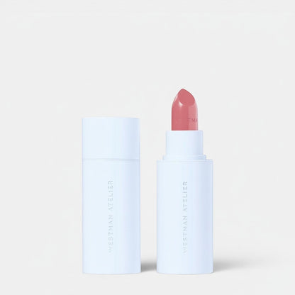 Shop Rescue Spa Hydrobalm Tinted Lipstick in a soft pink shade with a white minimalist tube and cap