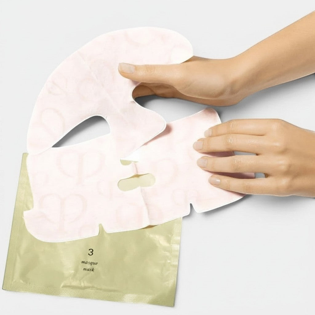 Shop Rescue Spa Illuminating Concentrate 3-step face and eye mask set with a pale pink sheet mask being applied