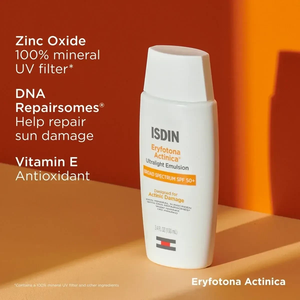 Shop Rescue Spa ISDIN Eryfotona Actinica mineral sunscreen bottle with SPF 50 on an orange background.
