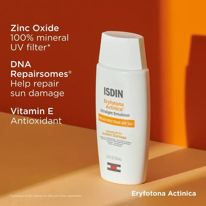 Shop Rescue Spa ISDIN Eryfotona Actinica mineral sunscreen bottle with SPF 50 on an orange background.