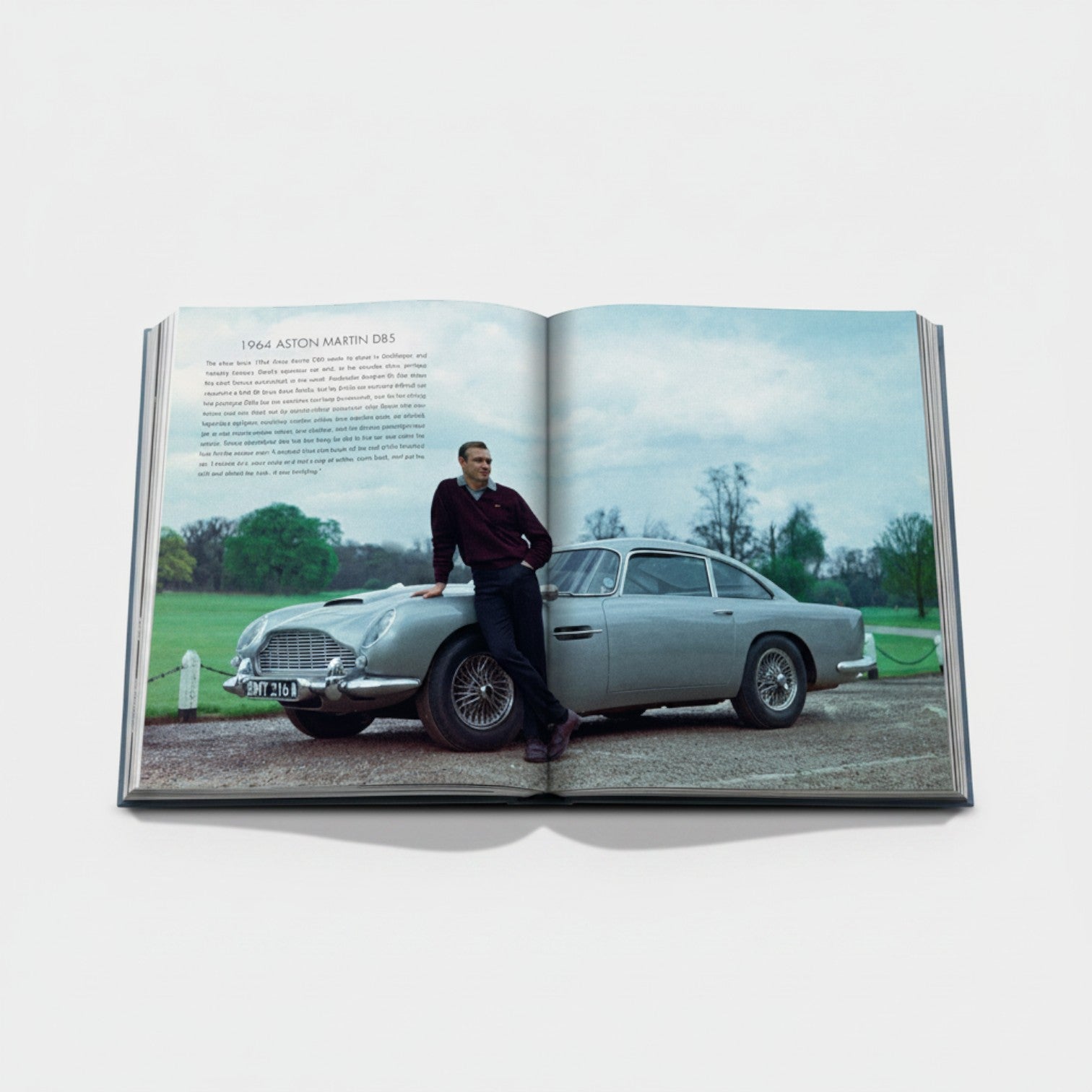 Shop Rescue Spa 1964 Aston Martin DB5 book featuring Sean Connery leaning on the car. Silk hardcover, 312 pages.